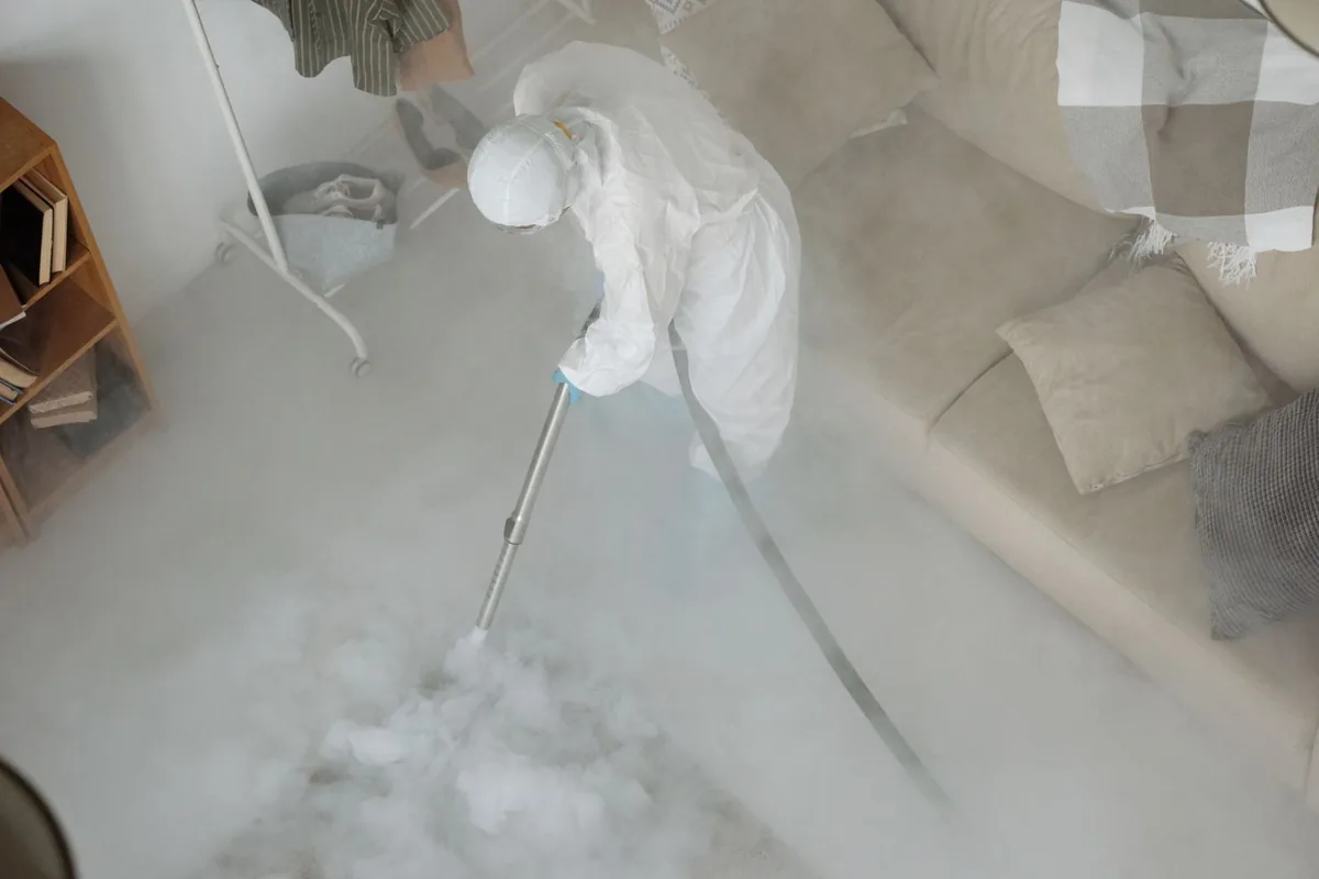 Biohazard cleanup technician in protective equipment, Raritan, NJ